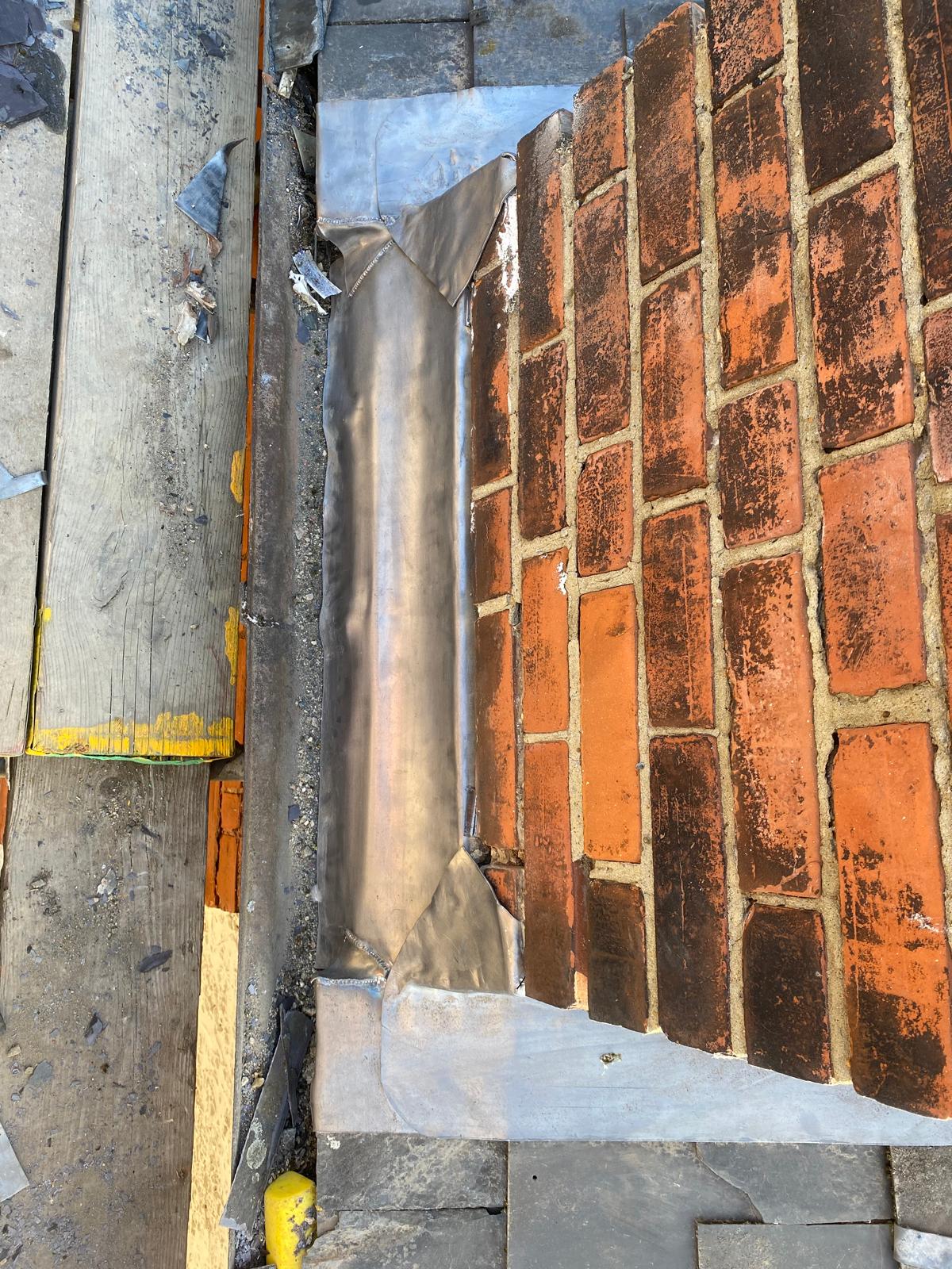 South London slate roof repair by J&H Spaces